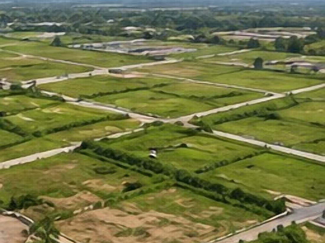 Aerial view of mechanized farmland under irrigation